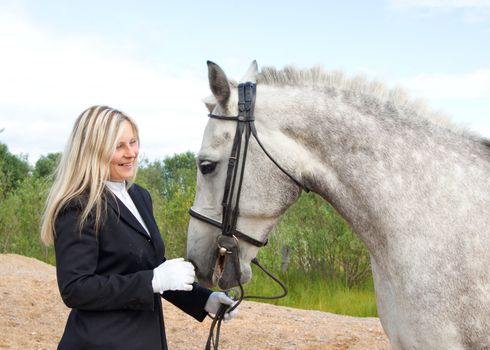 girl with horse.Friendship of an animal and the person