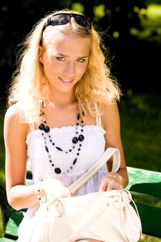 Beautiful young woman woman posing outdoors 