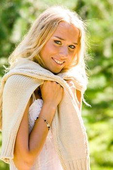 Portrait of lovely young woman outdoors