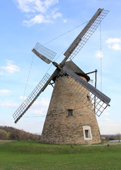 Windmill in the spring landscape.