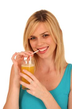 Beautiful blond girl smiling and sipping fresh orange juice