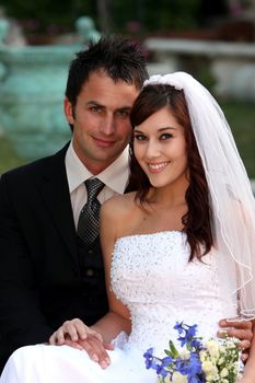 Gorgeous happy smiling couple on their wedding day