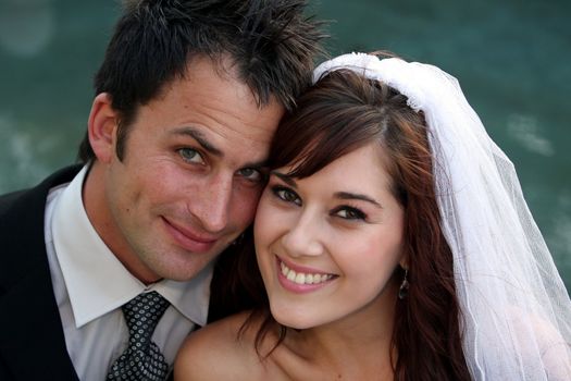 Gorgeous happy smiling couple on their wedding day