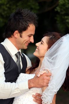 Joyful marriage couple dancing on their wedding day