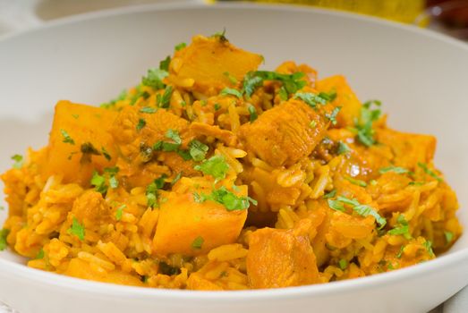 fresh home made curry beef rice and potatoes with ingredients around composition