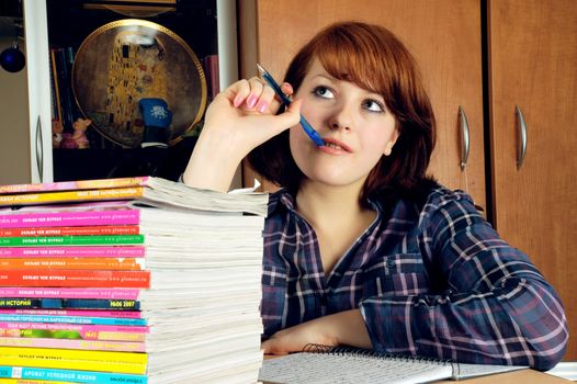 The young student does a homework of the Moscow university