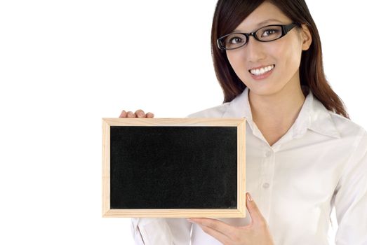 Business woman holding blank blackboard with smiling expression on white background.