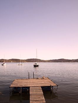 Sunset on the lake seen from the pier