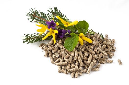 pellet, and spring flowers on a white background