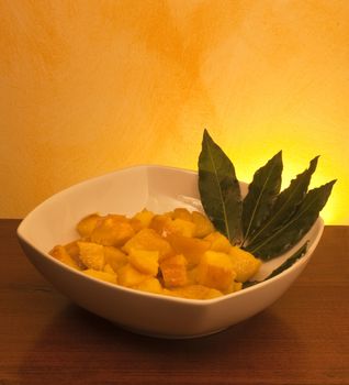 plate of boiled potatoes and seasoned background gradient
