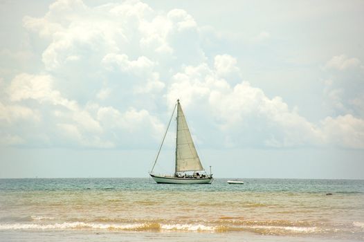 Boat sayling near the beach