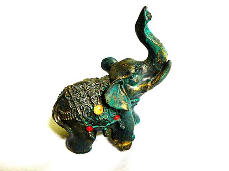 miniature elephant isolated green old
