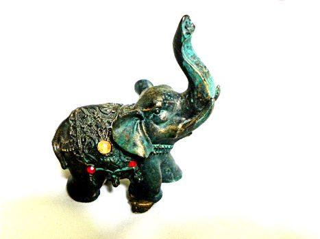 miniature elephant isolated green old
