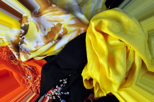 fabrics of different colors, decorated with pearls and fancy