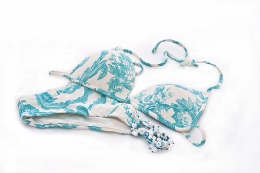 bikinis with blue flowers on white background