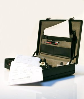 Black briefcase open on-white