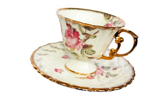 porcelain cup, porcelain saucer, drawing on the dishes, a rose on the cup, kitchenware