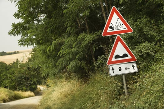 Road sign warnings, Tuscany.