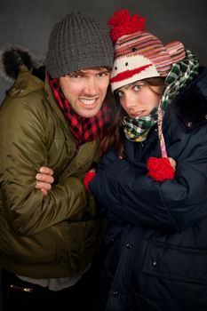 Hipster couple in clothing for cold weather