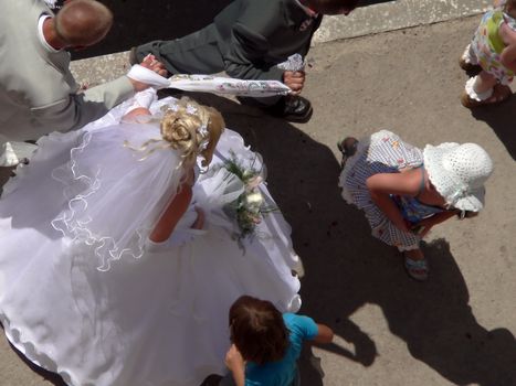 Bride with bouquet, view overhand