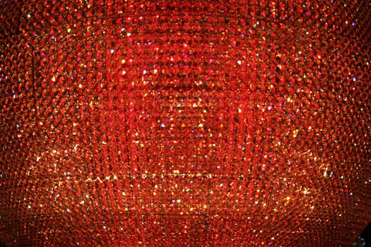 A abstract red crystal bead background or texture.
