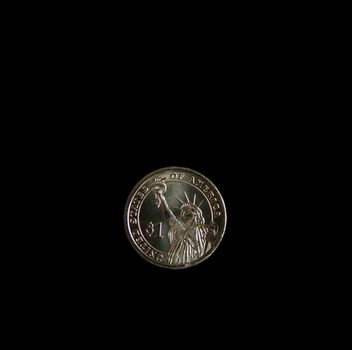 A one dollar statue of liberty US coin