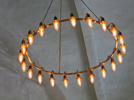 Simple old style Chandelier lamp in a church