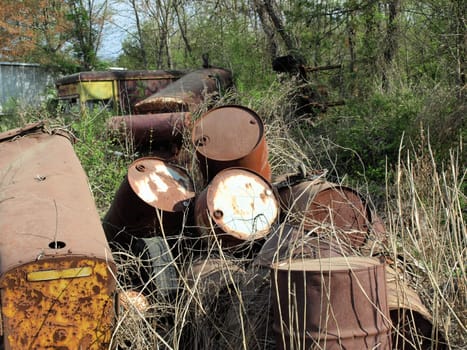 Aold oil barrels abandoned on a rural farm