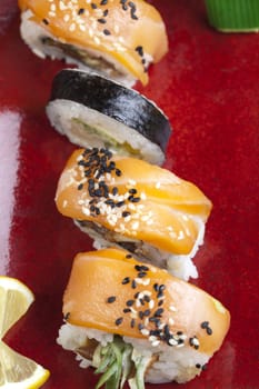 A complete sushi meal with chopsticks on tatami mat