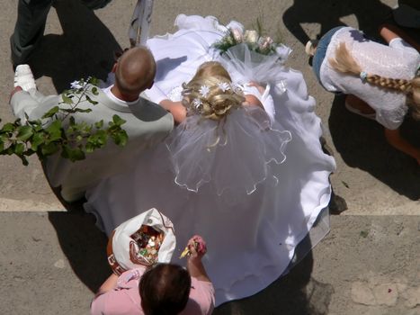 Bride in white gown and bridegroom