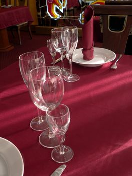 Wineglasses on table with purple tablecloth