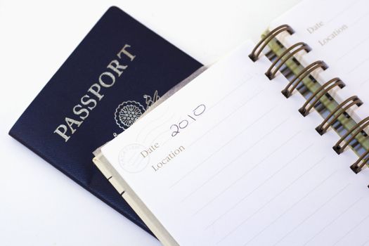 passport and notebook with date