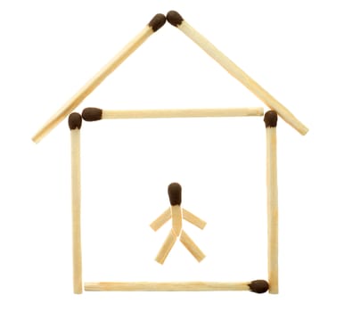 Small house with the little man laid out from matches on a white background