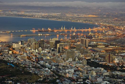 Cape Town city lights with the harbour at dusk