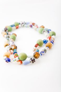 wooden and glasses beads of various colors, shapes and sizes