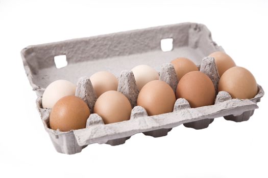 eggs in carton with white background