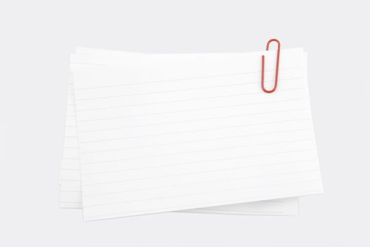 three pieces of line paper with a red clip (with clipping path)