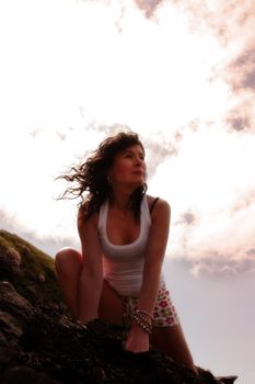 a beautiful woman doing yoga to show a healthy way to live a happy and relaxed lifestyle in a world full of stress