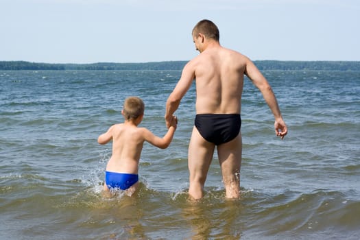 father with the son the lake