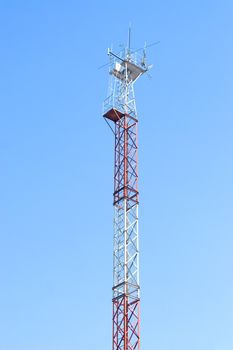 Cellular communication antena and blue sky background