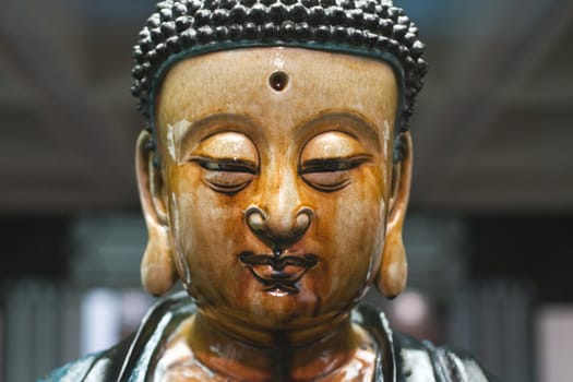 It is a close shot of Buddha.