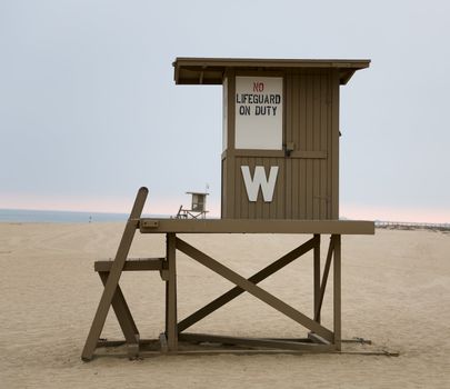 A lifeguard towers sit idle in the afternoon
