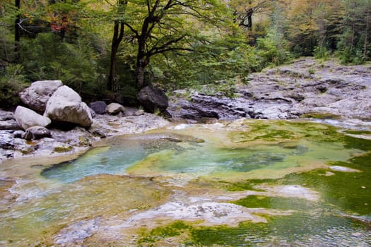 Mountain brook in Ordesa Nation park in Spain. Autumn time. Canyon Anisclo.