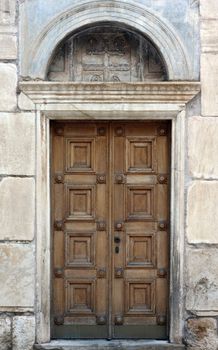 Antique side door of St. Eleftherios orthodox church in Athens, Greece