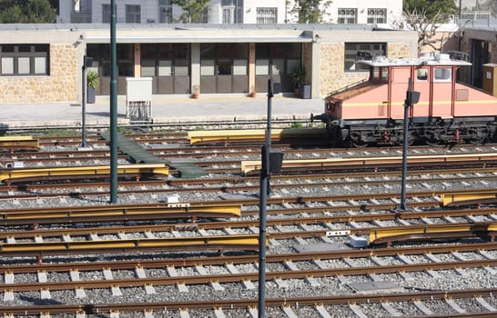 Railway tracks and depot with train in Athens, Greece