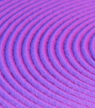 Abstract pattern - concentric circles on a purple sand