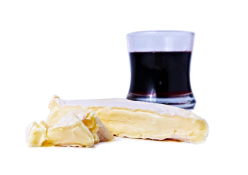 Brie cheese and gas of red wine isolated on white