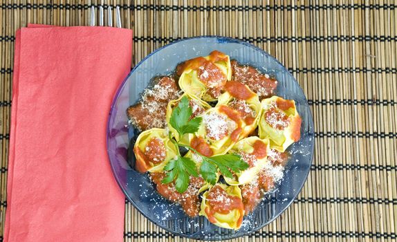 homemade tortellini with red sauce