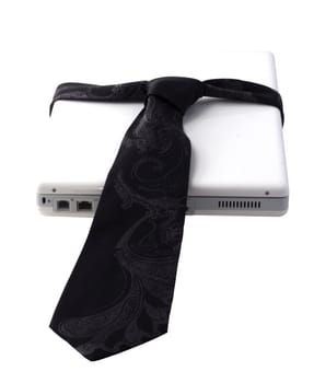 White laptop with a black tie around over white background