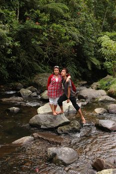mom and son get possed together in the middle of river